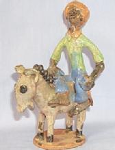 Ethnographic CARIBBEAN NATIVE ON A DONKEY Glazed Pottery Figurine
