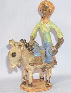 Ethnographic CARIBBEAN NATIVE ON A DONKEY Glazed Pottery Figurine