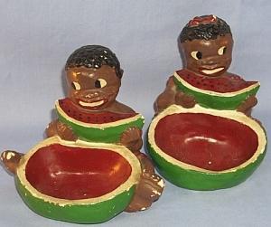Two Ethnographic Chalkware Ashtrays With Black Boy And Girl Eating Watermelon
