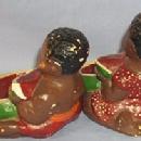 Two Ethnographic Chalkware Ashtrays With Black Boy And Girl Eating Watermelon