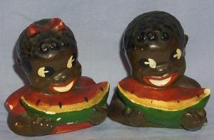 Ethnographic Chalkware Black Boy and Girl Eating Watermelon Salt and Pepper Set.