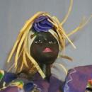 Ethnographic Doll In Purple Dress .