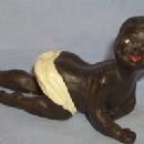 Ethnographic Porcelain Hand Painted CRAWLING Black Baby In Diapers Figurine.