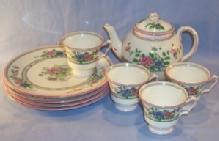 English Porcelain Flower Decorated TeaSet With Tea Pot And Four Luncheon Plates And Four Cups.
