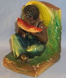 One Ethnographic Chalkware BookEnd BOY EATING WATERMELON