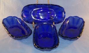 (4) Cobalt Blue Glass Banana Boat.