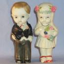 Hand Painted Bisque Porcelain Bride and Groom Figurines