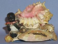 Ceramic, Black Boy Eating Watermelon On Seashell Niagara Falls Souvenir - Ethnographic