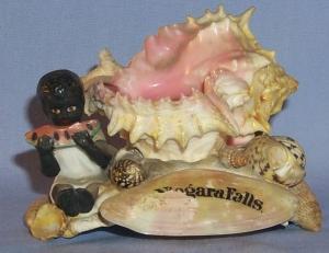 Ceramic, Black Boy Eating Watermelon On Seashell Niagara Falls Souvenir - Ethnographic