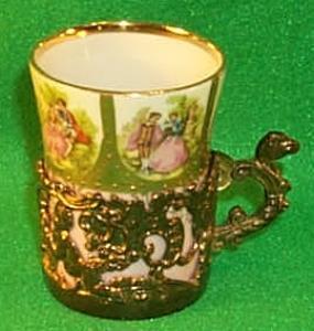 Small Porcelain Decorated Victorian Cup In Metal Holder