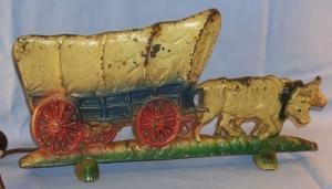 Cast Iron Oxen Pulled Coverd Wagon. Electric Lamp.