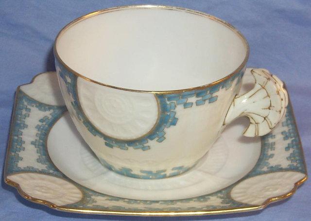 LIMOGES Shell Shaped Handle Porcelain Cup and Saucer Set