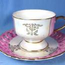Porcelain PINK LUSTRE luster Pierced Rim Cup & Saucer