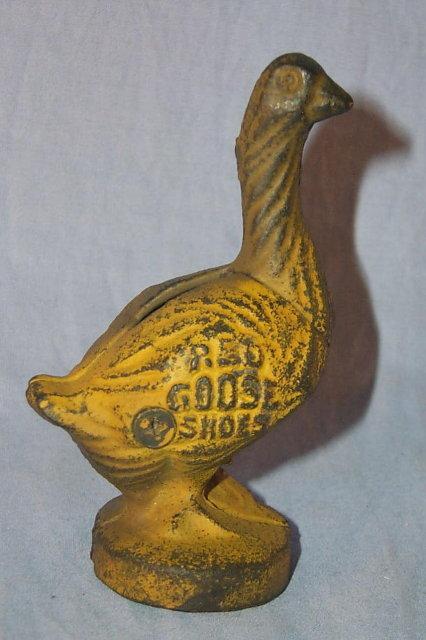 Yellow RED GOOSE SHOES Cast Iron Bank - Advertising