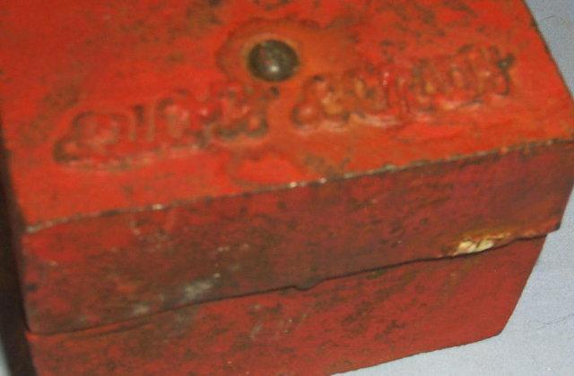 Red LUCK LINDY Cast Iron Bank - Metalware