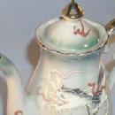 Eleven Piece Green Highlighted DRAGONWARE Porcelain Tea Set