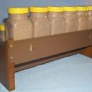 GRIFFITHS 12 Brown Glass Jar Spice Set on Wooden Rack