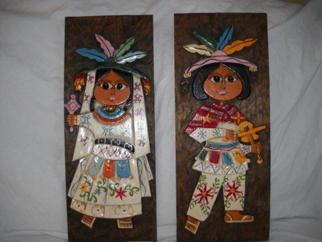 Hand chiseled and painted wall plaques