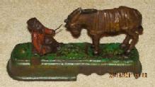 Always Did 'Spise A Mule Cast Iron Bank - Toys