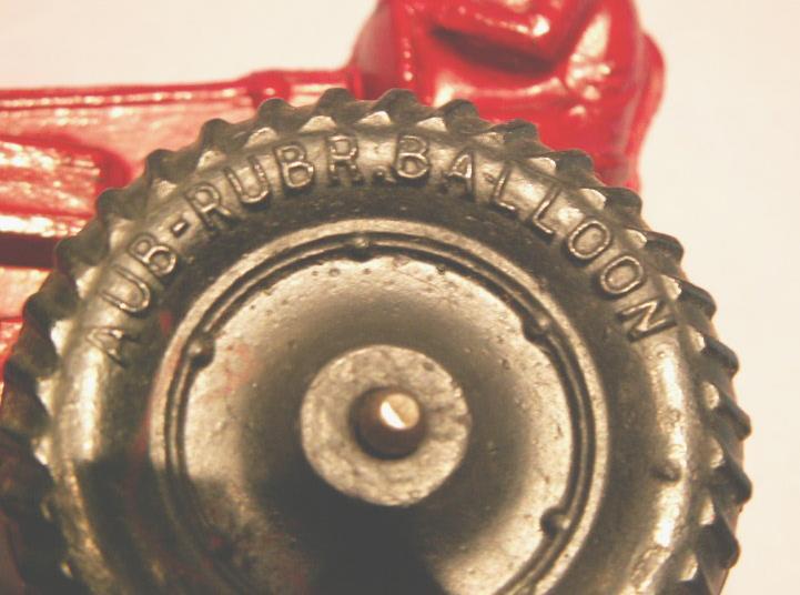 AUBURN Red Rubber Toy Farm Tractor.