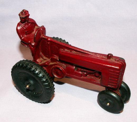 AUBURN Red Rubber Toy Farm Tractor.