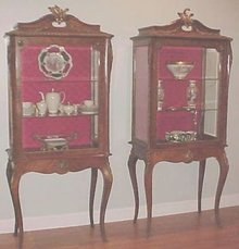 Rare - PAIR Hooded French Curio Cabinets Vitrines Cherubs and Garland Ormulu