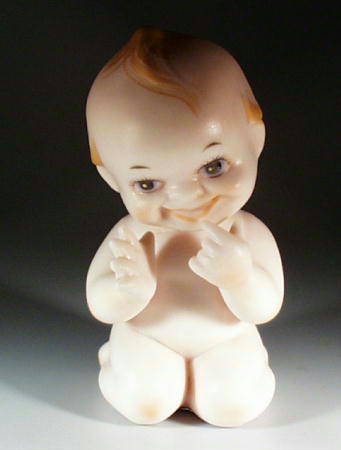 KEWPIE BISQUE DOLL