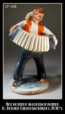 CZECH POTTERY ACCORDION PLAYER URBACH 1930's /