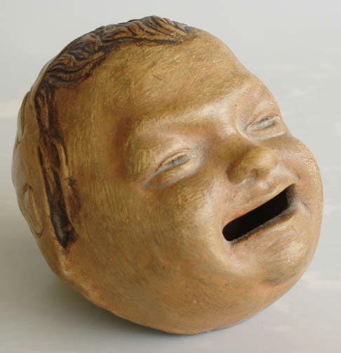 ANTIQUE GERMAN CRYING BABY FACE POTTERY COIN