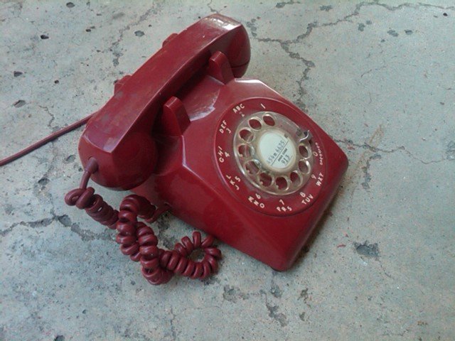 RETRO RED TELEPHONE CRADLE STYLE COMMUNICATION DEVICE ITT BRAND ROTARY DIAL PHONE