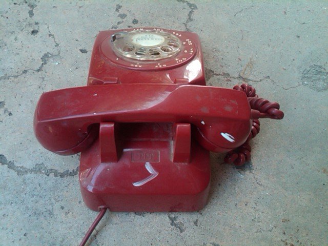 RETRO RED TELEPHONE CRADLE STYLE COMMUNICATION DEVICE ITT BRAND ROTARY DIAL PHONE