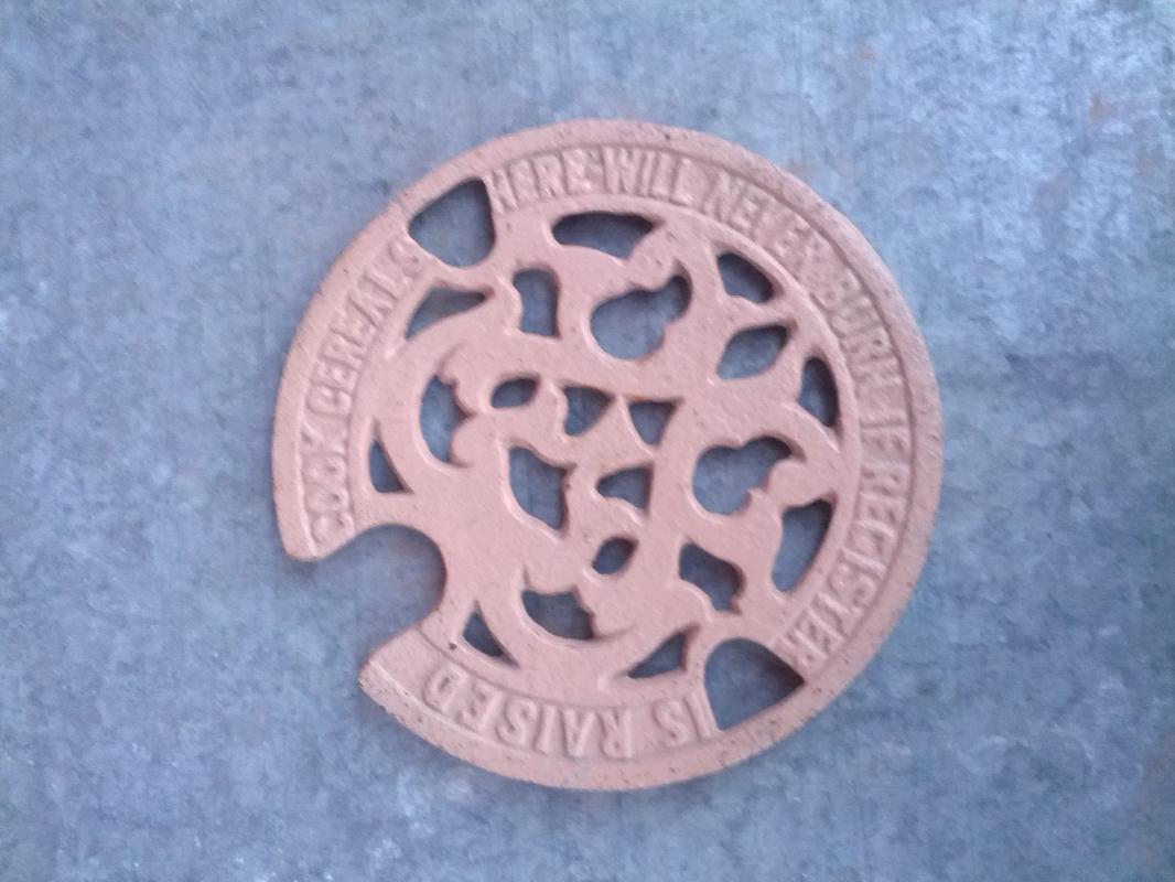 cast iron cook stove trivet decorative burner cover primitive kitchen tool food preparation utensil