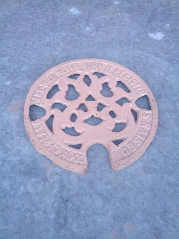 cast iron cook stove trivet decorative burner cover primitive kitchen tool food preparation utensil