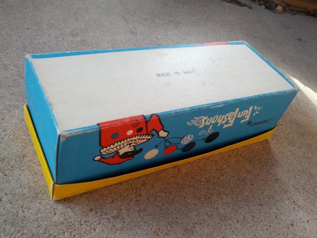 fun fashions colorful shoe box childrens apparel advertising clown balloon haiti