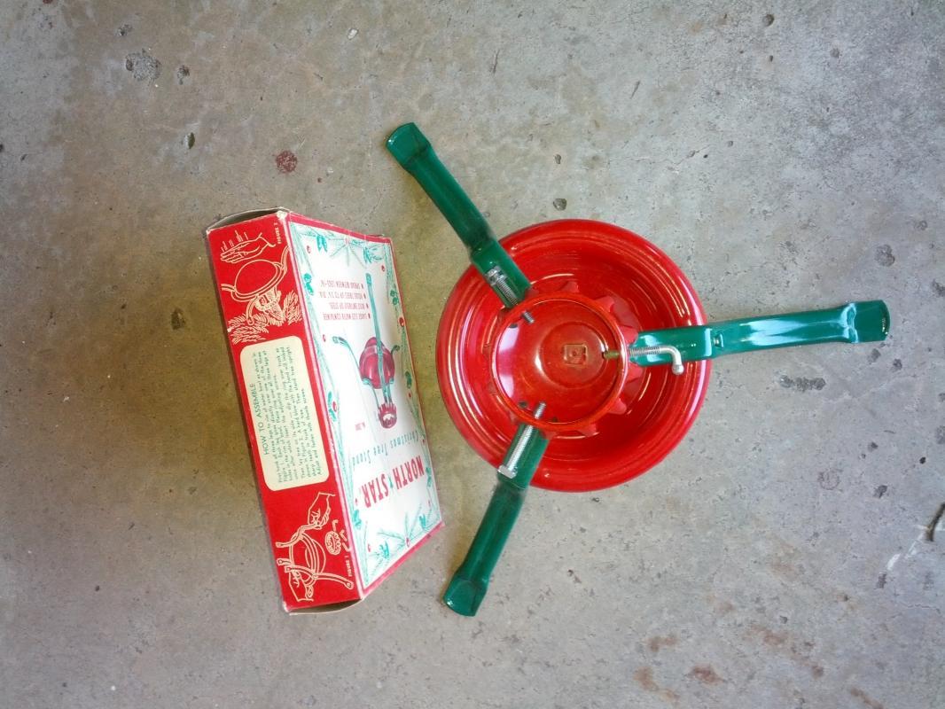 1950's red green steel christmas tree stand holiday fixture north star original cardboard box usa manufactured product