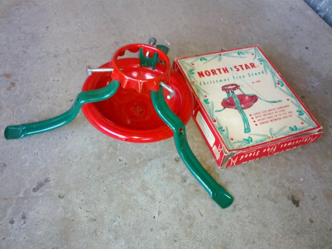1950's red green steel christmas tree stand holiday fixture north star original cardboard box usa manufactured product