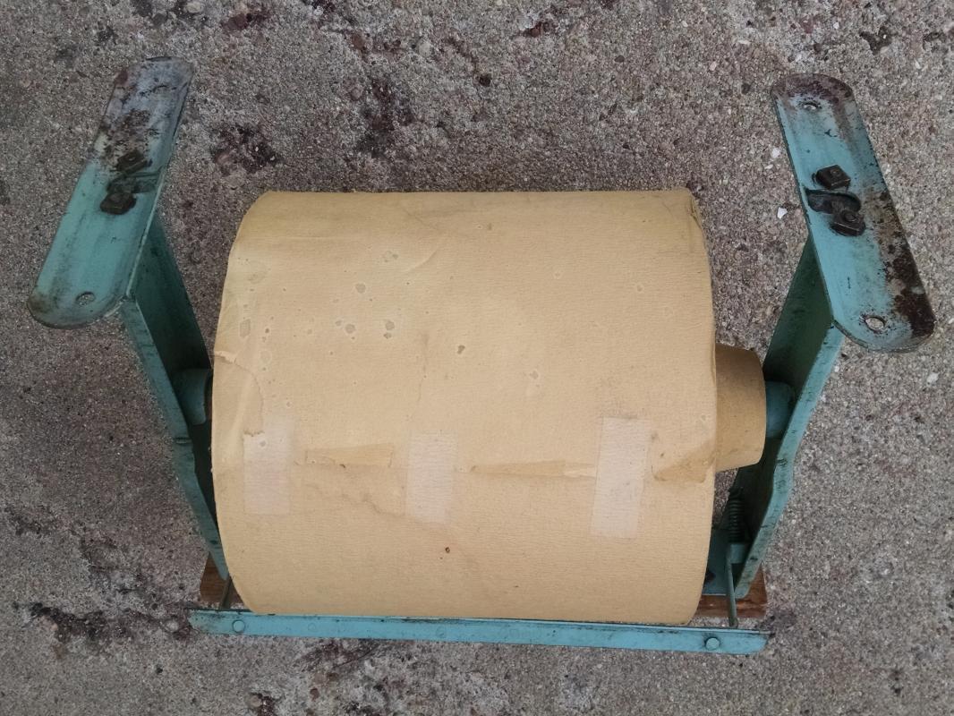 store wrapping roll paper dispenser check out counter package box wrap tool business display fixture american depression era packaging gadget
