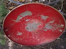 steel round disc style sled 1950's snow hill sliding equipment childrens winter toy old red painted wall decoration retro game room ornament