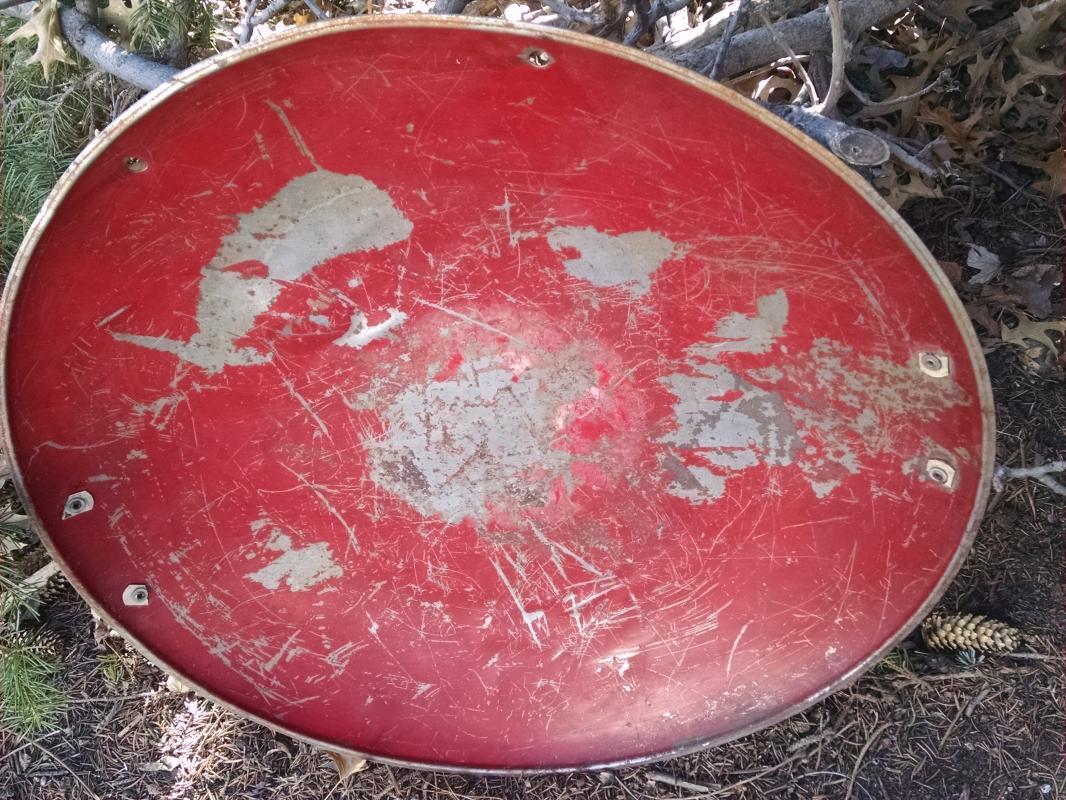 steel round disc style sled 1950's snow hill sliding equipment childrens winter toy old red painted wall decoration retro game room ornament