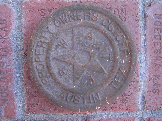 AUSTIN TEXAS CAST IRON WATER CAP PROPERTY MARKER DISC