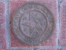 AUSTIN TEXAS CAST IRON WATER CAP PROPERTY MARKER DISC