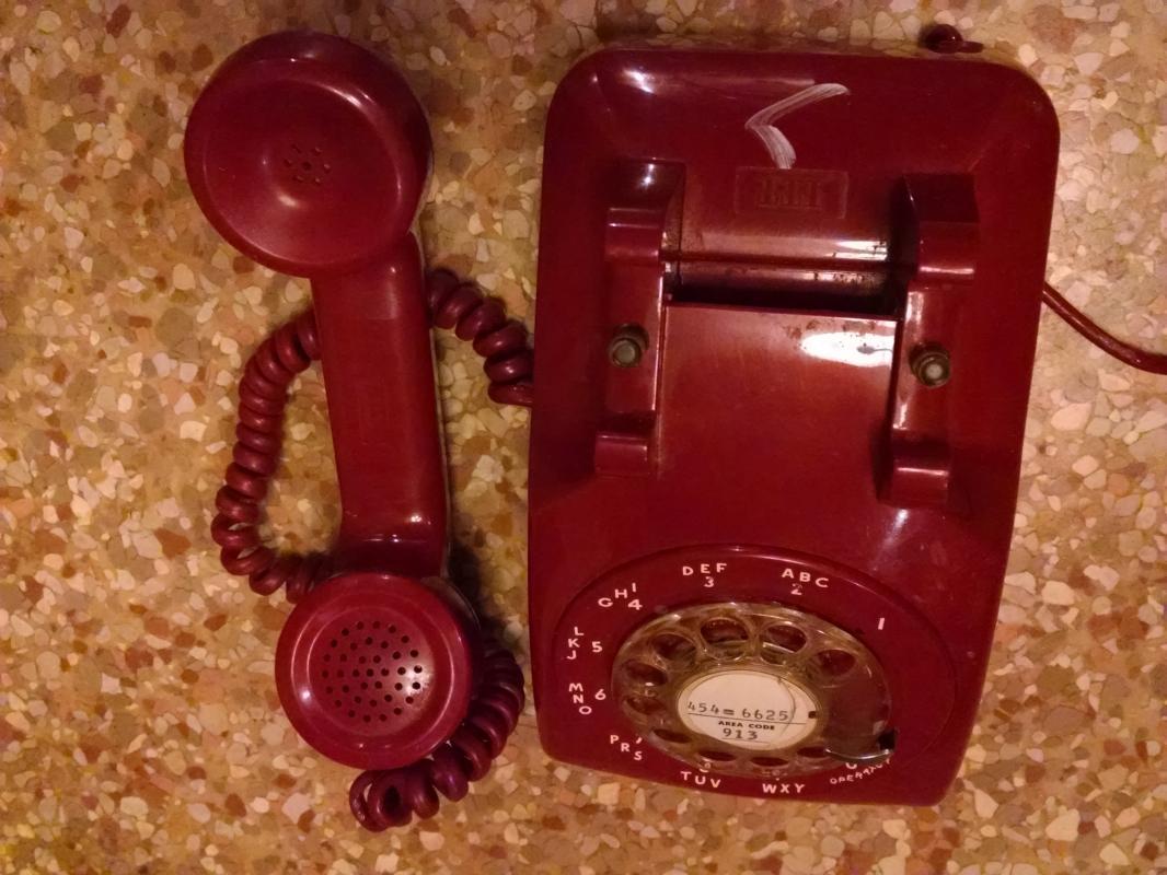 RETRO RED TELEPHONE CRADLE STYLE COMMUNICATION DEVICE ITT BRAND ROTARY DIAL PHONE