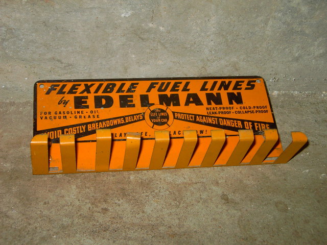 EDELMANN AUTOMOBILE CAR FLEXIBLE FUEL LINE STEEL SIGN WALL DISPLAY ADVERTISING HOOK SERVICE STATION FIXTURE