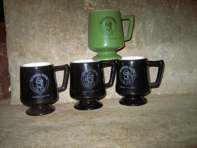 UNITED STATES U S PUMP VERTICAL MOTORS MUG FOOTED COFFEE CUP BLACK GREEN GLAZE ADVERTISING UTENSIL