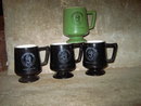 UNITED STATES U S PUMP VERTICAL MOTORS MUG FOOTED COFFEE CUP BLACK GREEN GLAZE ADVERTISING UTENSIL