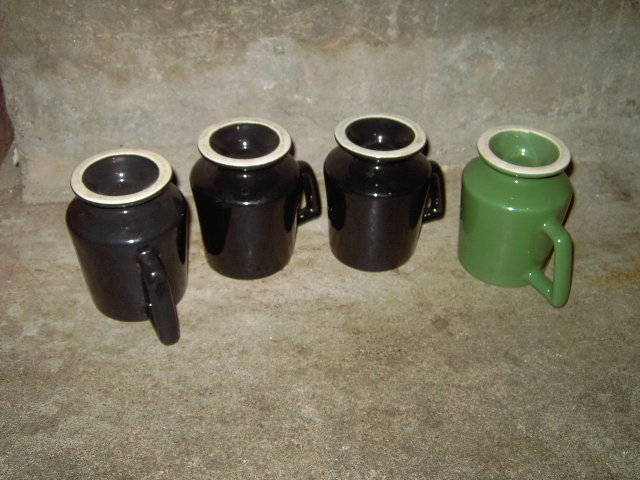 UNITED STATES U S PUMP VERTICAL MOTORS MUG FOOTED COFFEE CUP BLACK GREEN GLAZE ADVERTISING UTENSIL