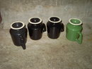 UNITED STATES U S PUMP VERTICAL MOTORS MUG FOOTED COFFEE CUP BLACK GREEN GLAZE ADVERTISING UTENSIL