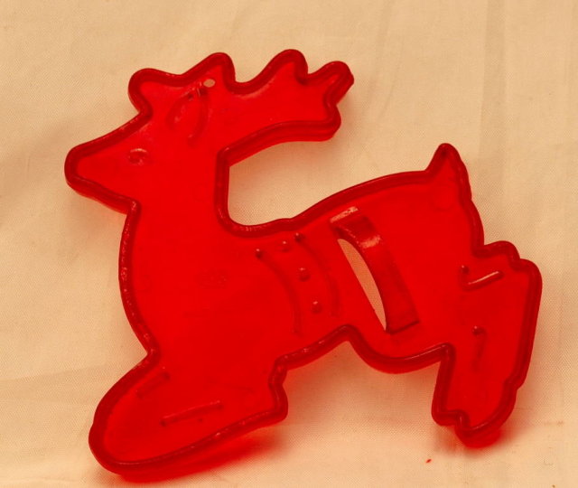 HRM Vintage Red Plastic Cookie Cutter - Christmas leaping Reindeer.