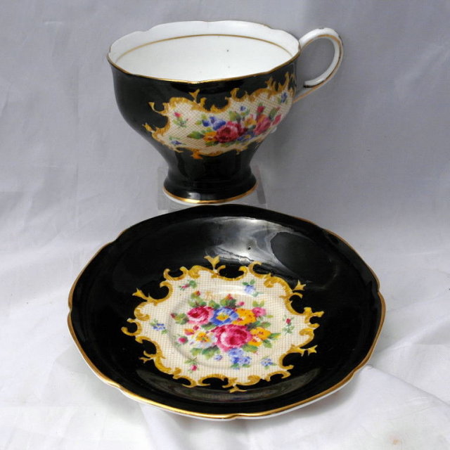 Paragon by Appointment to H.M. The Queen & H.M. Queen Mary Fine Bone China Tea Cup, Saucer Black with Lattice Roses