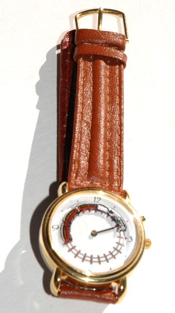 Train Watch, Train moves round on track & whistles !